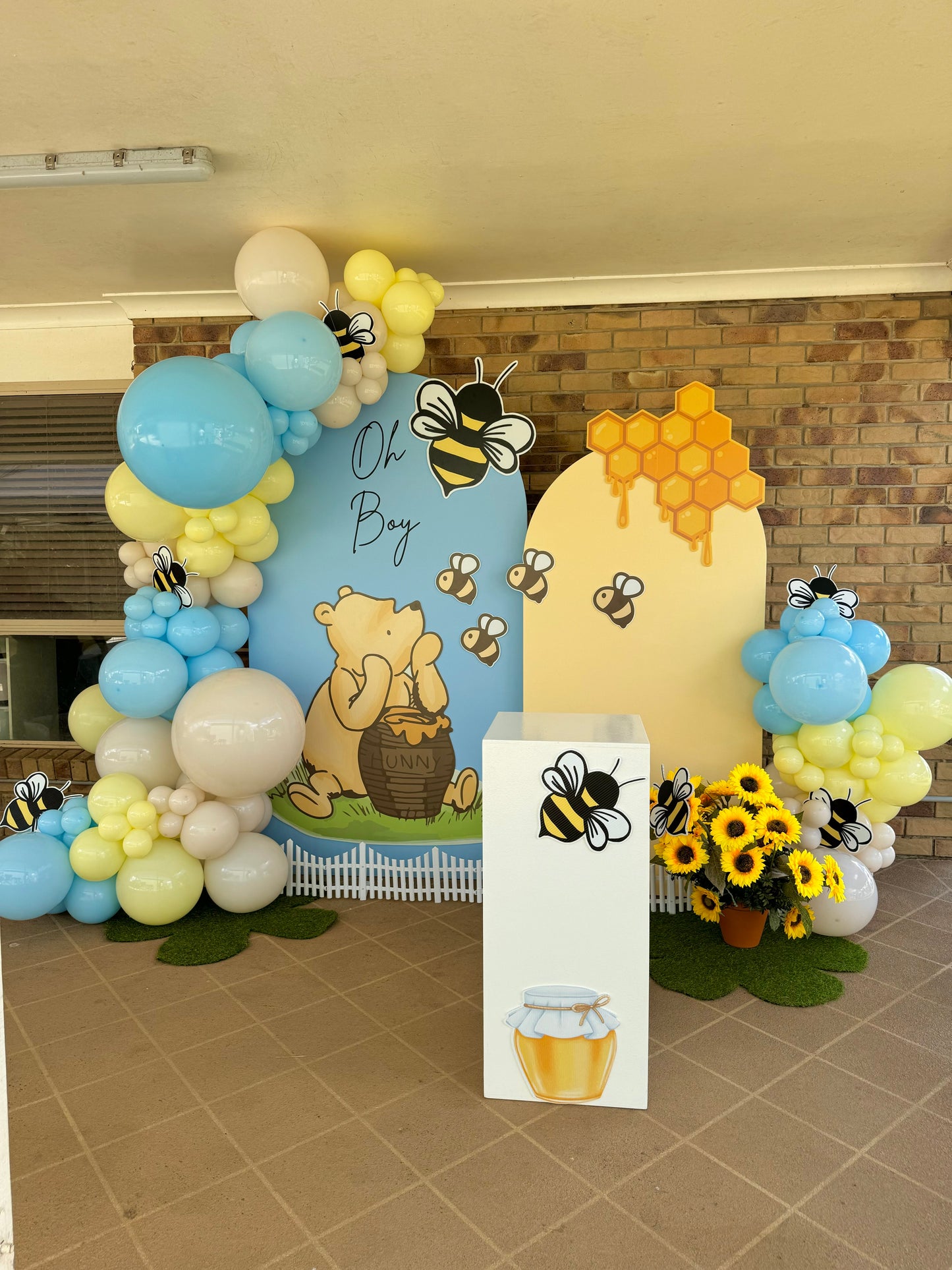 Stunning Brisbane Balloons balloon arch at a Winnie the Pooh themed baby shower, featuring vibrant colors and playful design, Winnie the Pooh baby shower with a beautifully crafted Brisbane Balloons balloon arch, featuring pastel-colored balloons and a fun atmosphere, Brisbane Balloons balloon arch decoration for a baby shower, showcasing a playful and cheerful design ideal for a Winnie the Pooh theme