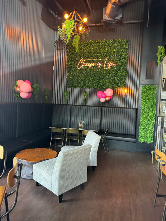 Beautifully arranged balloons in various colors at a party venue in Brisbane, adding a cheerful touch to the celebration, A delivery of bright balloons ready for a celebration in Brisbane, showcasing festive party supplies