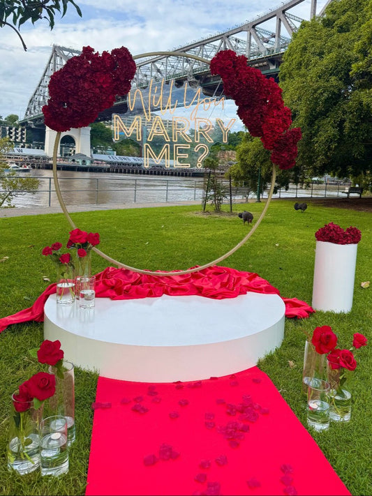 Romantic proposal setup in Brisbane, Gold Coast, and Sunshine Coast with personalized decor, florals, and lighting for an unforgettable moment.