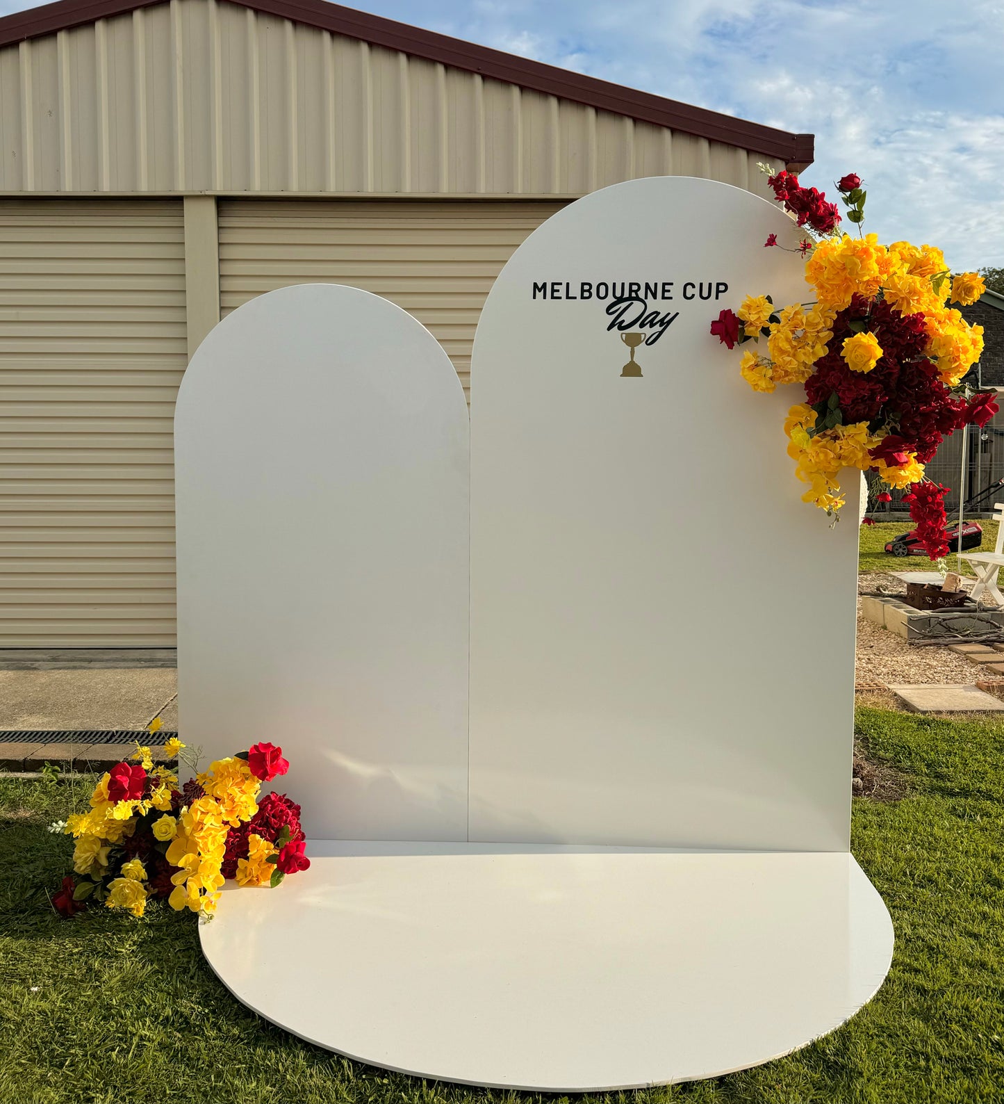 Melbourne Cup floral arch, event decor Melbourne Cup, floral backdrop, racing event decorations, reusable floral arch, customizable event decor, spring racing backdrop, stunning photo backdrop.