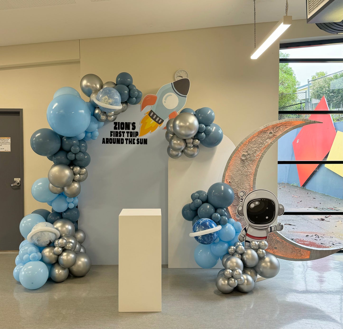 Space-themed birthday balloon arch for kids party in Brisbane, featuring colorful balloons and cosmic designs for a fun and festive birthday celebration