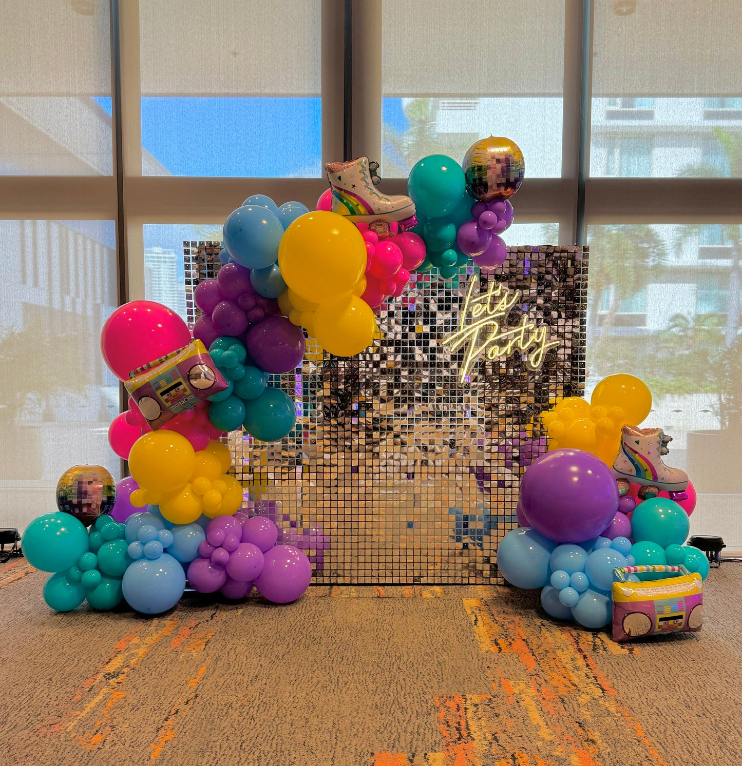 Shimmer Wall and Balloons Hire Brisbane - Elegant event backdrop with sparkling shimmer wall and vibrant balloon decor for weddings, parties, and celebrations in Brisbane