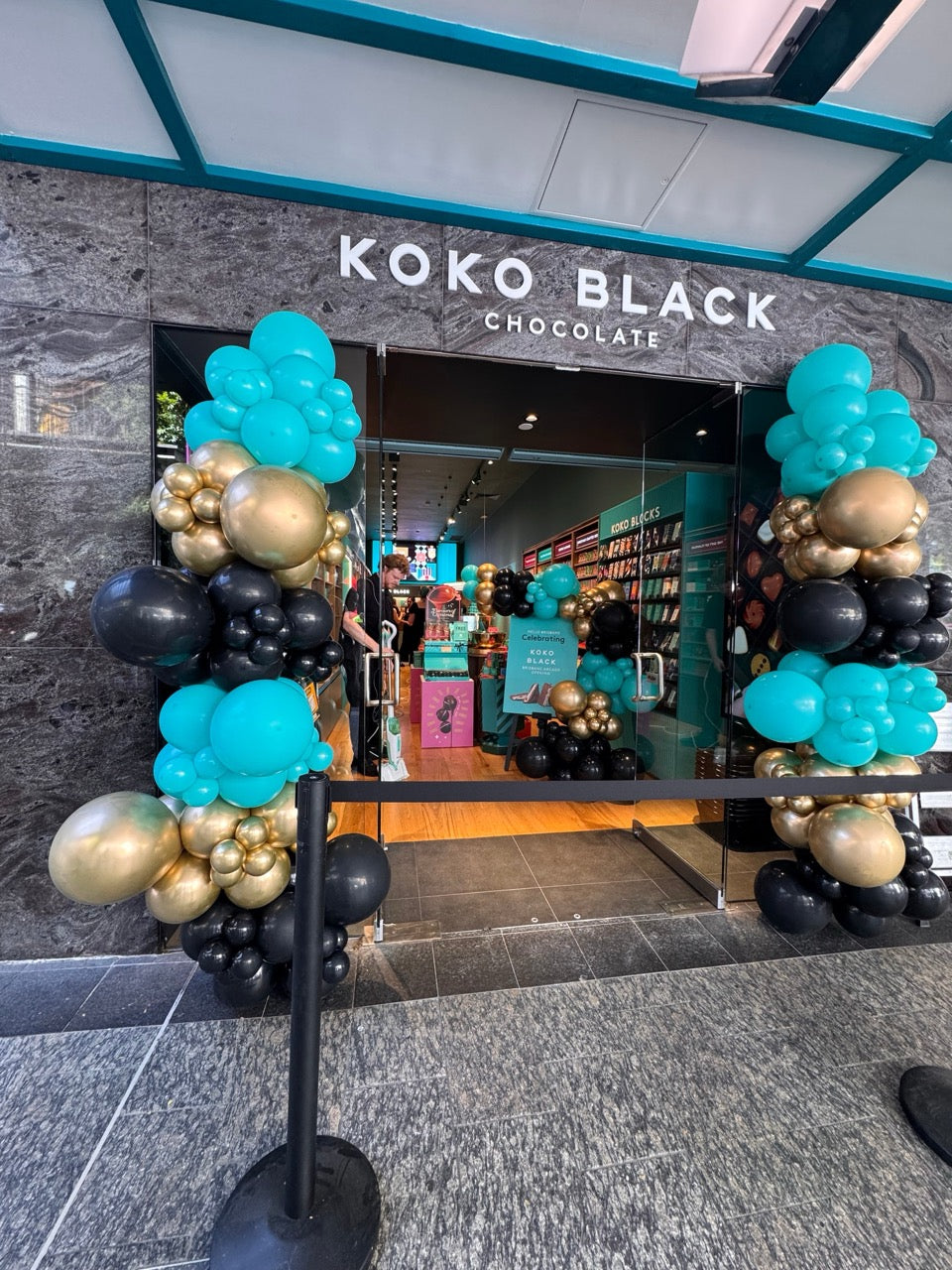 Koko Black chocolate store entrance with decorative balloons